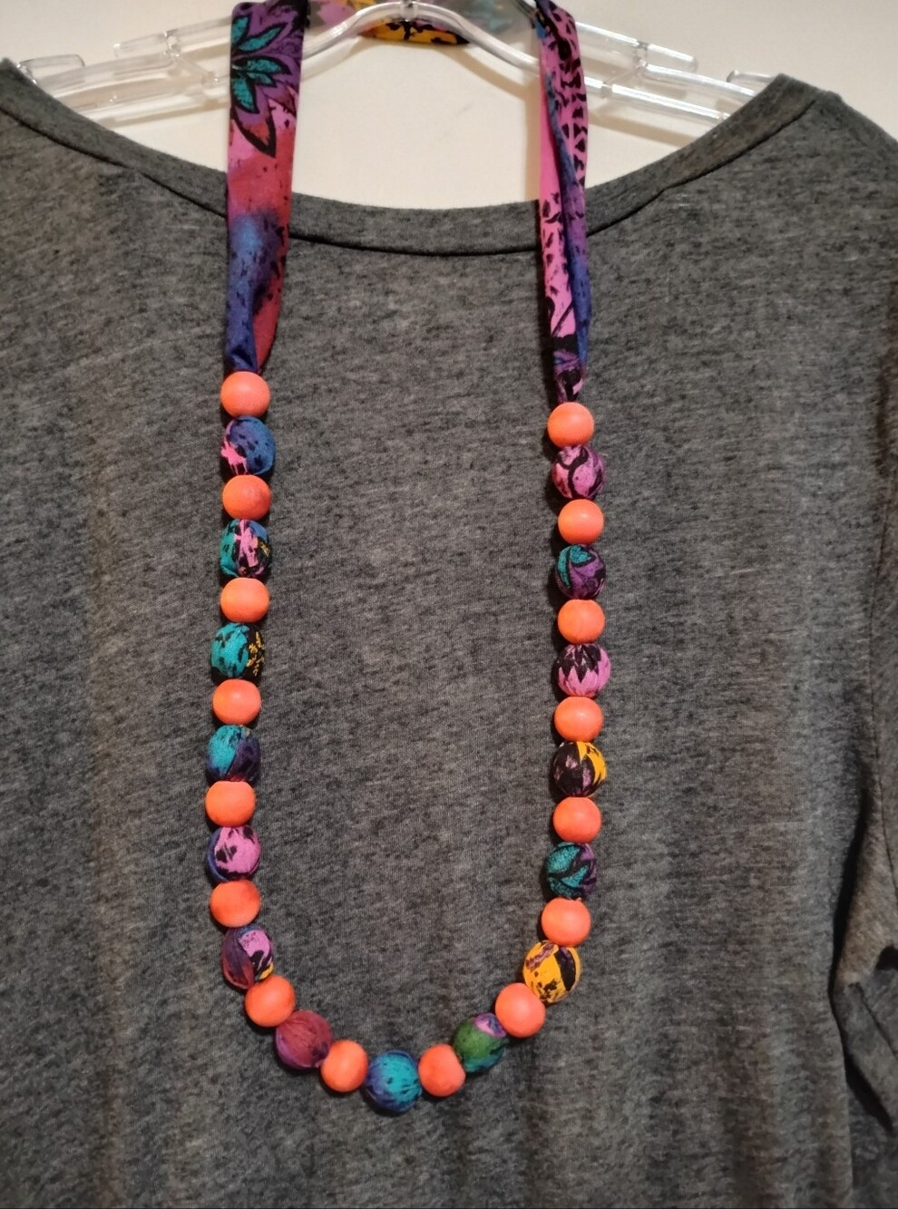 Handmade Fabric Wooden Bead Necklace with Neon Coral Accents Adjustable Length